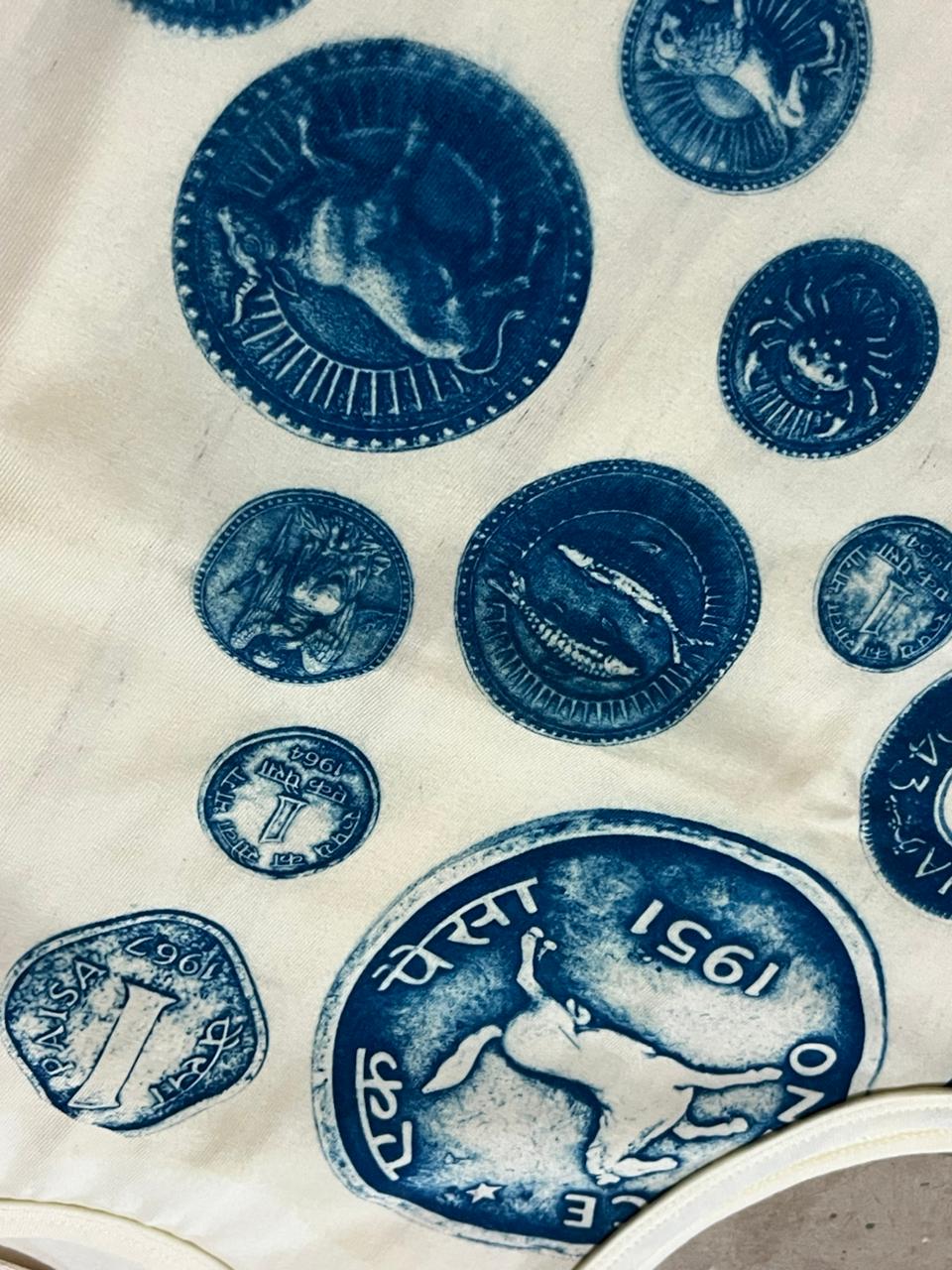 Blue celestial designs on a textured white fabric background, detailed print, tank top, comfort wear, cool print, tops